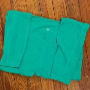 Athleta stash pocket salutation tights